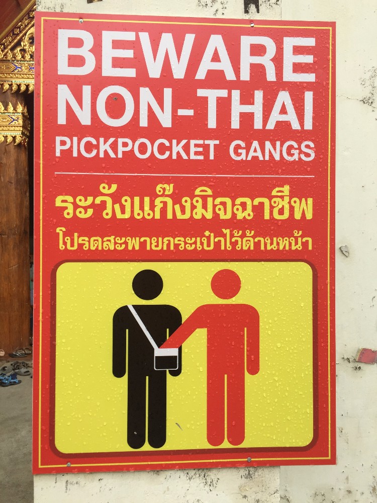 Just think about how much a well-placed comma can save potential theft. Because, really, who is the victim and who is the perpetrator here? Are the non-Thais supposed to be watching out for the pickpocket gangs? Or are those infamous Dutch pickpocket gangs stealing tourists' white shoulder bags again? Keep your eyes open!