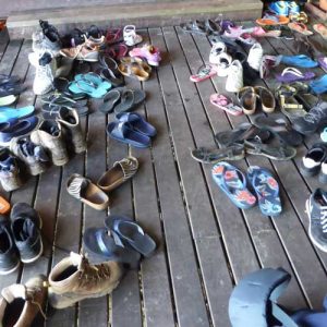 7 Reasons to Take Your Family on a Group Travel Holiday [shoes in Billit, Borneo, Malaysia]