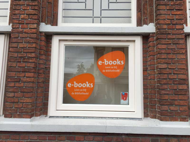 Do the Dutch read books on e-readers? [Library window, Barneveld, The Netherlands]